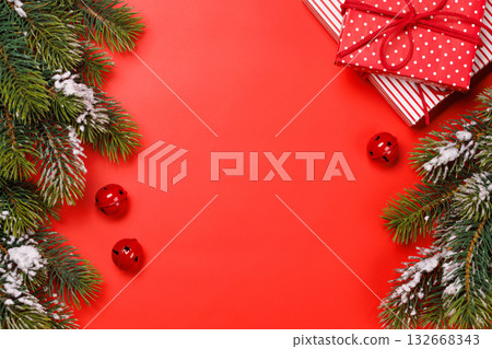 Christmas background with snowy fir tree branches Christmas background with snowy fir tree branches 132668343