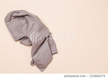 Kitchen towel on beige table 132668375