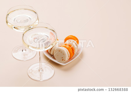 Pairing of champagne and delicate macaroons Pairing of champagne and delicate macaroons 132668388