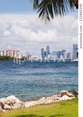 Modern skyline of Miami with towering skyscrapers, tropical vibe, and waterfront views Modern skyline of Miami with towering skyscrapers, tropical vibe, and waterfront views 132668399