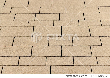 Tile texture on a pedestrian sidewalk with geometric pattern Tile texture on a pedestrian sidewalk with geometric pattern 132668887