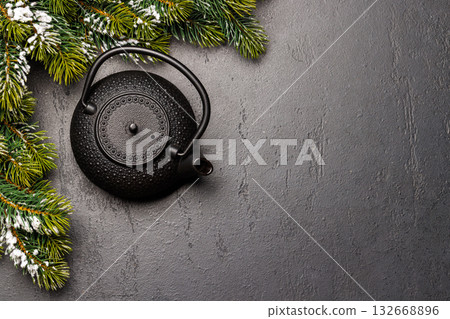 Christmas tea setting with teapot and fir tree branches Christmas tea setting with teapot and fir tree branches 132668896