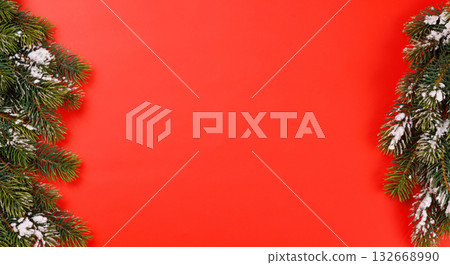 Christmas background with snowy fir tree branches 132668990