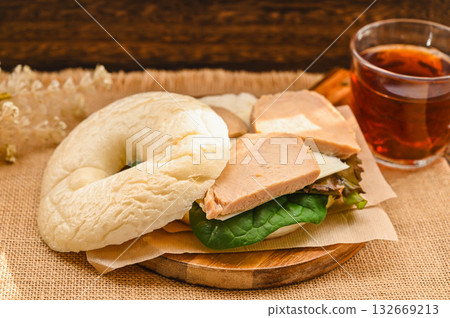 Chicken bagel sandwich 132669213