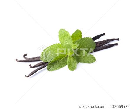 Vanilla stick with mint on white backgrounds Vanilla stick with mint on white backgrounds 132669574