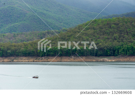 Tourist Boat Cruising on Lake in Thailand 132669608