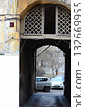 Weathered Yellow Archway Passage with Lattice Window to Urban Street Weathered Yellow Archway Passage with Lattice Window to Urban Street 132669955