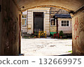 Weathered Archway Tunnel Framing Colorful Residential Courtyard Space Weathered Archway Tunnel Framing Colorful Residential Courtyard Space 132669975