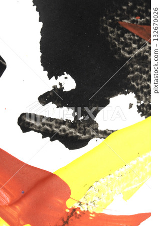 Vibrant thick red black and yellow acrylic paint splashes lines and swirls on a white background 132670026