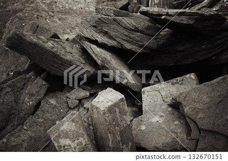 Large grey rocks and moss create a natural landscape. 132670151