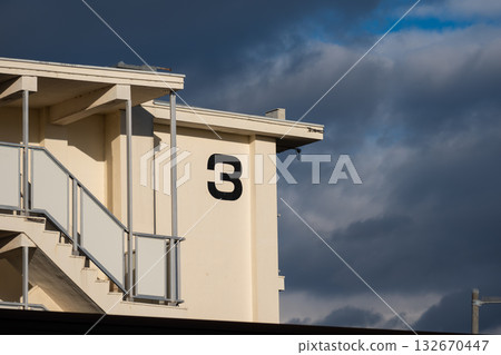 Contrast between the building numbers and the sky 132670447