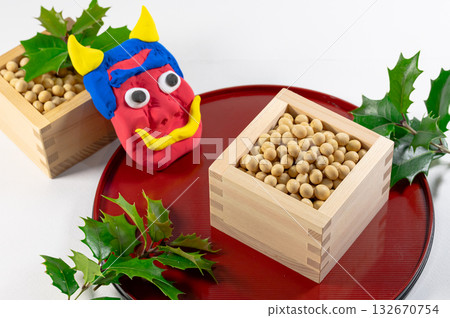 Setsubun demon and soybeans in a wooden box 132670754