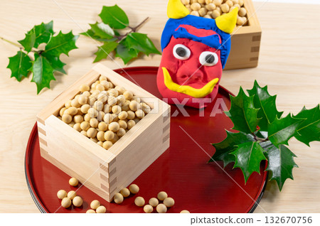 Setsubun demon and soybeans in a wooden box 132670756