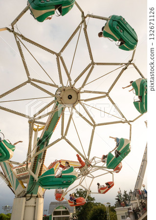 Amusement park rides, thrilling attractions, Toshimaen Troika 132671126