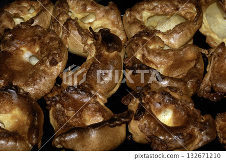 Close up of home make Yorkshire pudding roasted batter for Sunday roast dinner 132671210