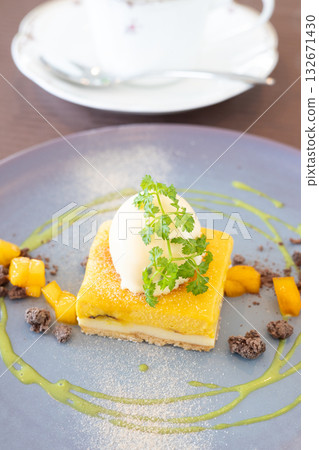 Delicious vanilla ice cream and cheesecake dessert with coffee Delicious vanilla ice cream and cheesecake dessert with coffee 132671430