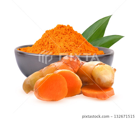 Turmeric powder in bowl with turmeric sticks on white background. Turmeric powder in bowl with turmeric sticks on white background. 132671515