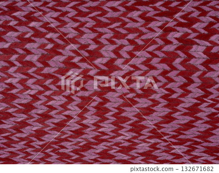 Rich crimson and lavender chevron pattern on a textured veneer backdrop Rich crimson and lavender chevron pattern on a textured veneer backdrop 132671682