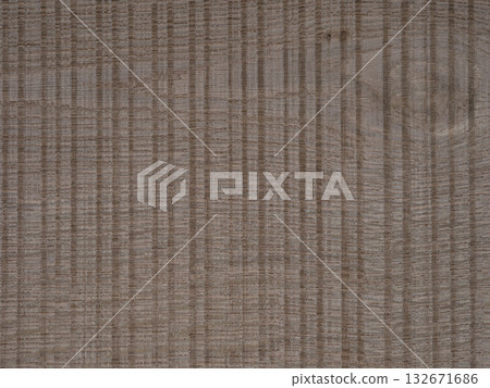 Silver gray European oak veneer showcasing a distinctive positive saw cut texture. Silver gray European oak veneer showcasing a distinctive positive saw cut texture. 132671686