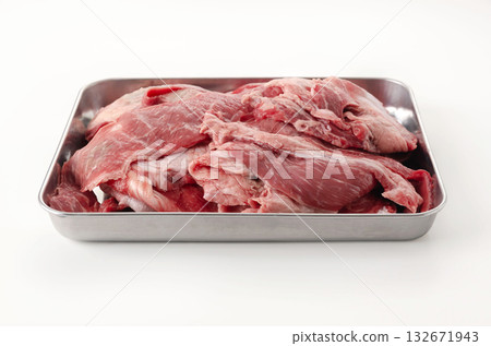 Raw beef tendon in a stainless steel tray 132671943