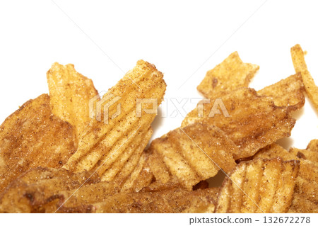 Close up of fresh crinkle cut seasoned crisps snack 132672278