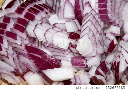 Close up of chopped sliced red onions prep for dinner Close up of chopped sliced red onions prep for dinner 132672685