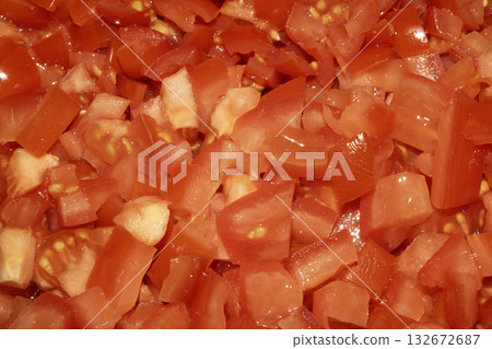 Close up of chopped sliced red tomatoes Close up of chopped sliced red tomatoes 132672687
