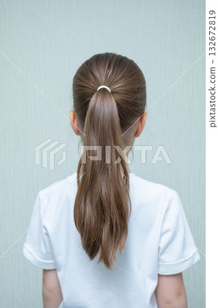 A little girl at a hair salon. A little girl at a hair salon. 132672819
