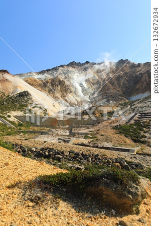 A clear autumn sky and the crater of Mt. Esan seen from the hiking trail (Hakodate, Hokkaido, Japan) 132672934