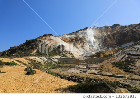 A clear autumn sky and the crater of Mt. Esan seen from the hiking trail (Hakodate, Hokkaido, Japan) 132672935