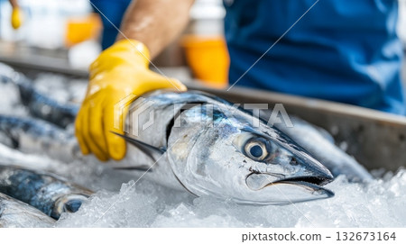 Expert Techniques for Fresh Fish Handling in the Vibrant Seafood Market An Impressive Blue Fish Selection Expert Techniques for Fresh Fish Handling in the Vibrant Seafood Market An Impressive Blue Fish Selection 132673164
