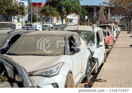 Damaged cars and debris from flooding caused by floods from hurricane DANA in Valencia, Spain on November 18, 2024 132673307
