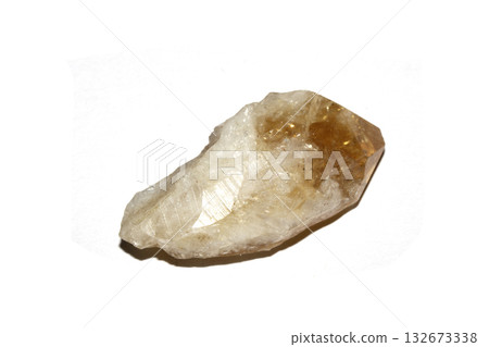 Close up of a healing crystal quartz rock stone on white background Close up of a healing crystal quartz rock stone on white background 132673338