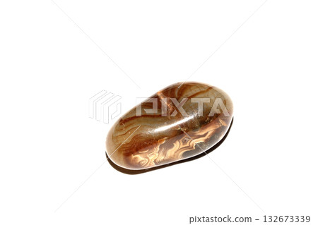 Close up of a healing crystal quartz rock stone on white background Close up of a healing crystal quartz rock stone on white background 132673339