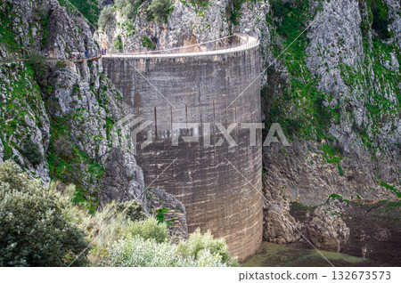 Hiking to Montejaque dam (Presa de Montejaque) and Hundidero cave (Cueva del Hundidero) in the province of Malaga, Andalusia, Spain Hiking to Montejaque dam (Presa de Montejaque) and Hundidero cave (Cueva del Hundidero) in the province of Malaga, Andalusia, Spain 132673573