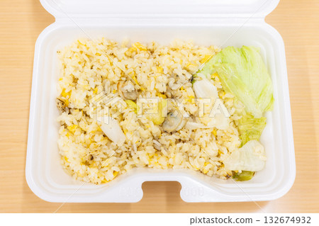 Delicious seafood lettuce fried rice bento Delicious seafood lettuce fried rice bento 132674932