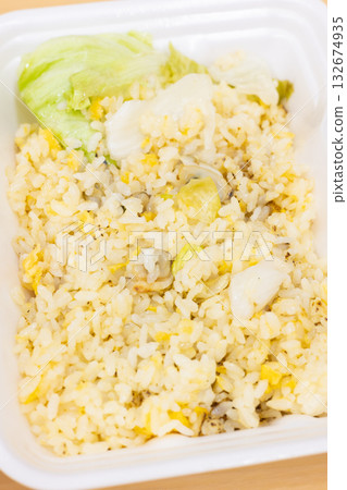 Delicious seafood lettuce fried rice bento Delicious seafood lettuce fried rice bento 132674935