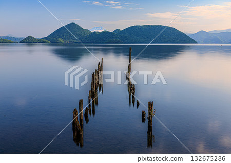 The sky reflected in the lake - the tranquility of Toya The sky reflected in the lake - the tranquility of Toya 132675286