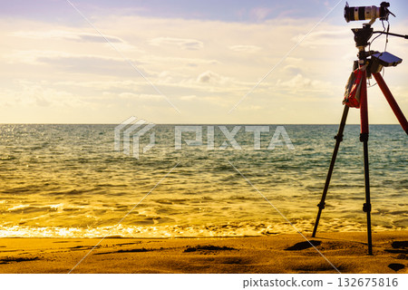 Camera taking picture film of sea coast 132675816
