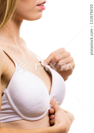 Female wearing too big bra 132676050