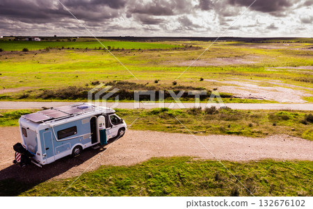 Caravan solar panels on roof camping on nature. Aerial view 132676102