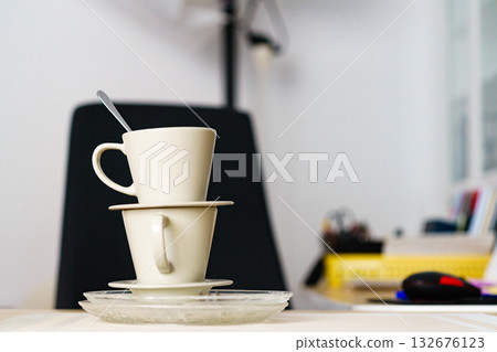 Dirty cups after coffee drinking, messy desk Dirty cups after coffee drinking, messy desk 132676123