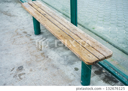 Bus station with wooden bench 132676125