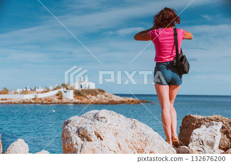 Tourist take photo from Agios Fokas Peloponnese Greece Tourist take photo from Agios Fokas Peloponnese Greece 132676200
