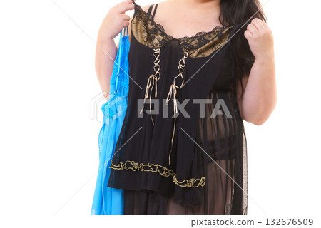 Woman plus size holding babydoll 132676509