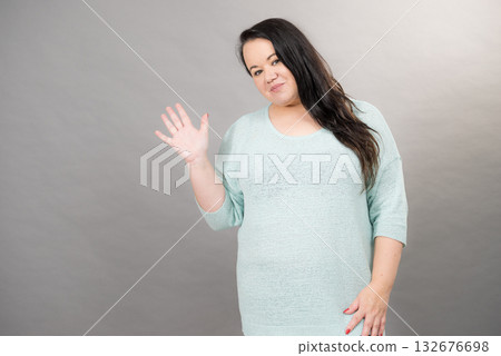 Plus size mature woman in jumper Plus size mature woman in jumper 132676698