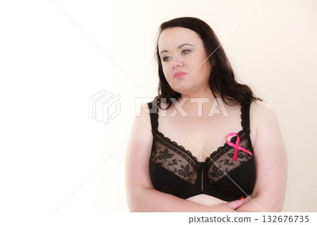 Big woman in bra with pink cancer ribbon Big woman in bra with pink cancer ribbon 132676735
