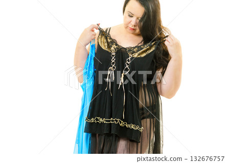 Plus size woman fitting satin nightwear Plus size woman fitting satin nightwear 132676757