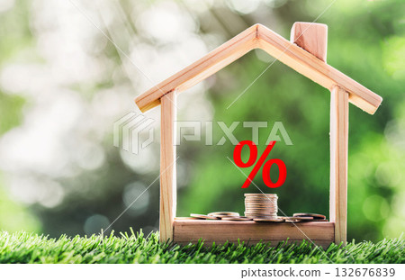Mortgage rates business concept of investment housing real estate interest rates 3d home appraisal. planning savings money of coins to buy a home 132676839