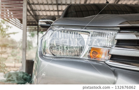 Details about headlights of a Gray modern car close up. Rear lights of a new sports car. 132676862